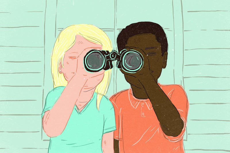 white girl and black boy looking through one lens each of a pair of binoculars