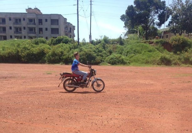Tom learning to ride