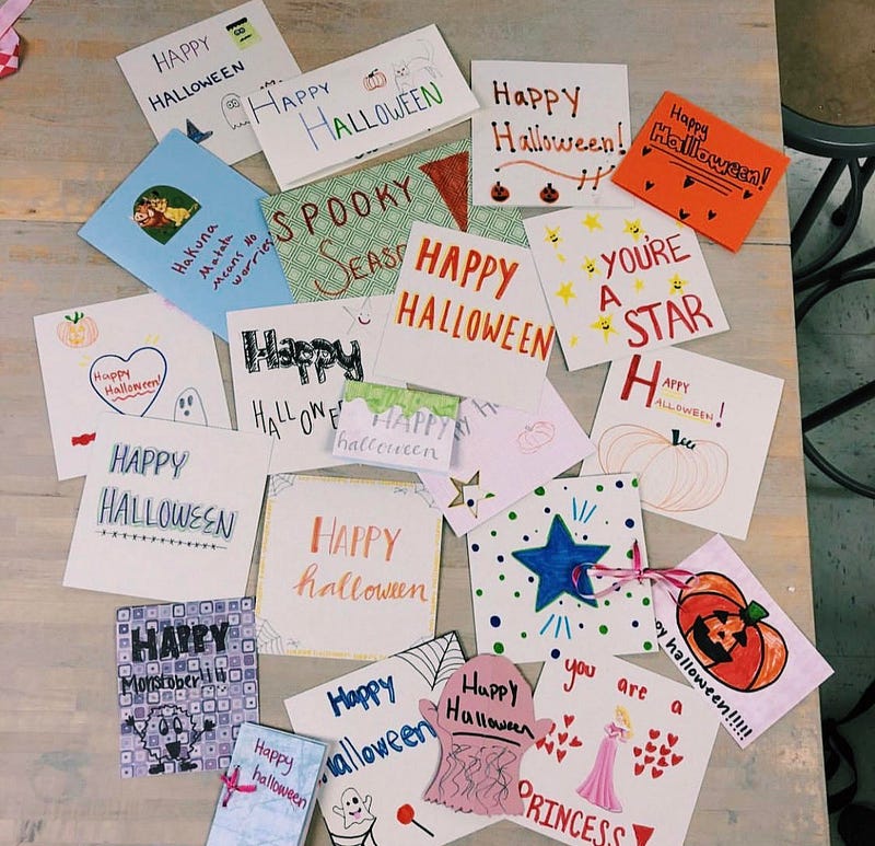 A pile of halloween cards for kids