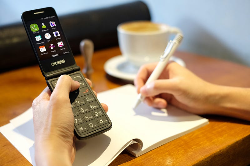 Featured image for Ditching My iPhone for a Flip Phone Made Me See How Useless Smartphones Can Be