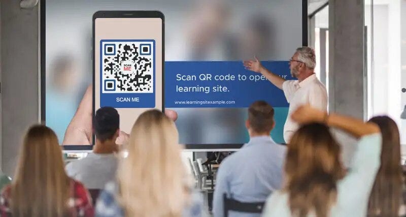 Professor letting students scan a QR code.