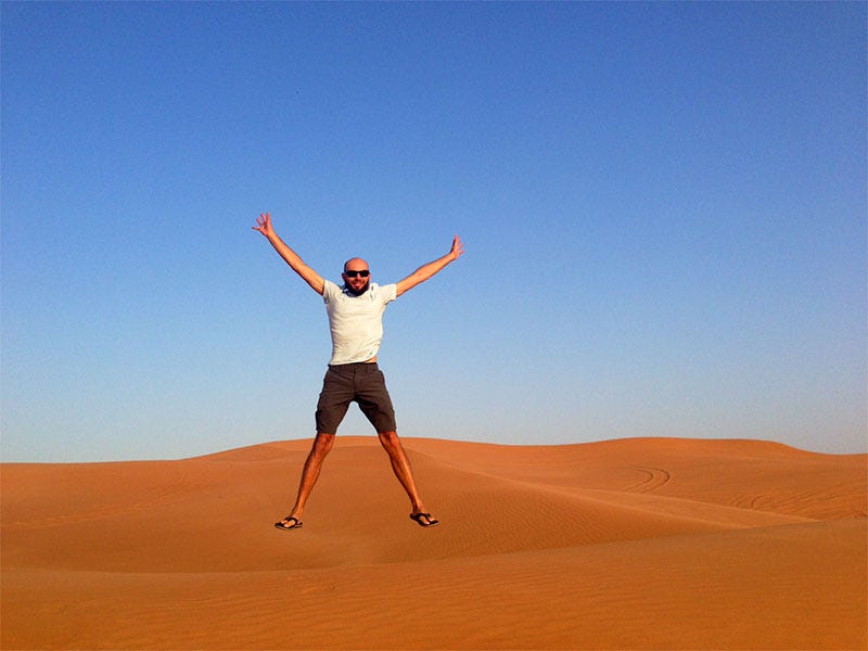 Greg jumping in the desert