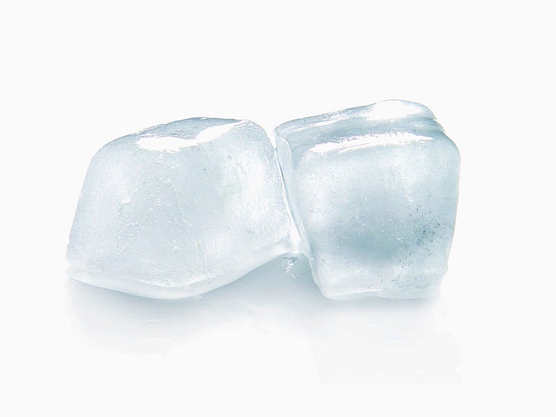 Picture of 2 ice cubes with a white background.