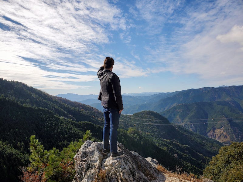 Donny Kimball gazes out over a valley in rural Tokushima Prefecture from a viewpoint near Tairyu-ji