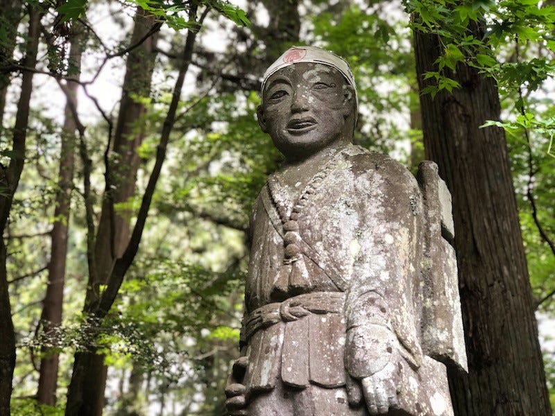 A statue of a Fujiko climber about to ascend Mt. Fuji at Yamanashi Prefecture’s Kitaguchi-Hongu Fuji Sengen Shrine