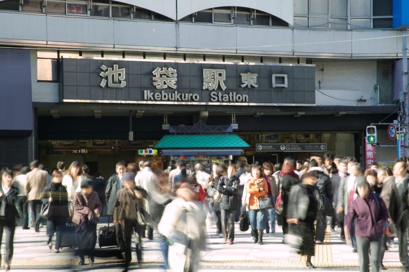 People transit at Ikebukuro Station en route to Sugamo in Tokyo