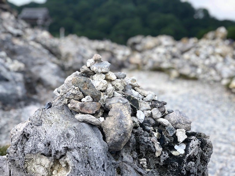 A pile of rocks for the deceased at Mt. Osore (Osorezan) in Aomori Prefecture