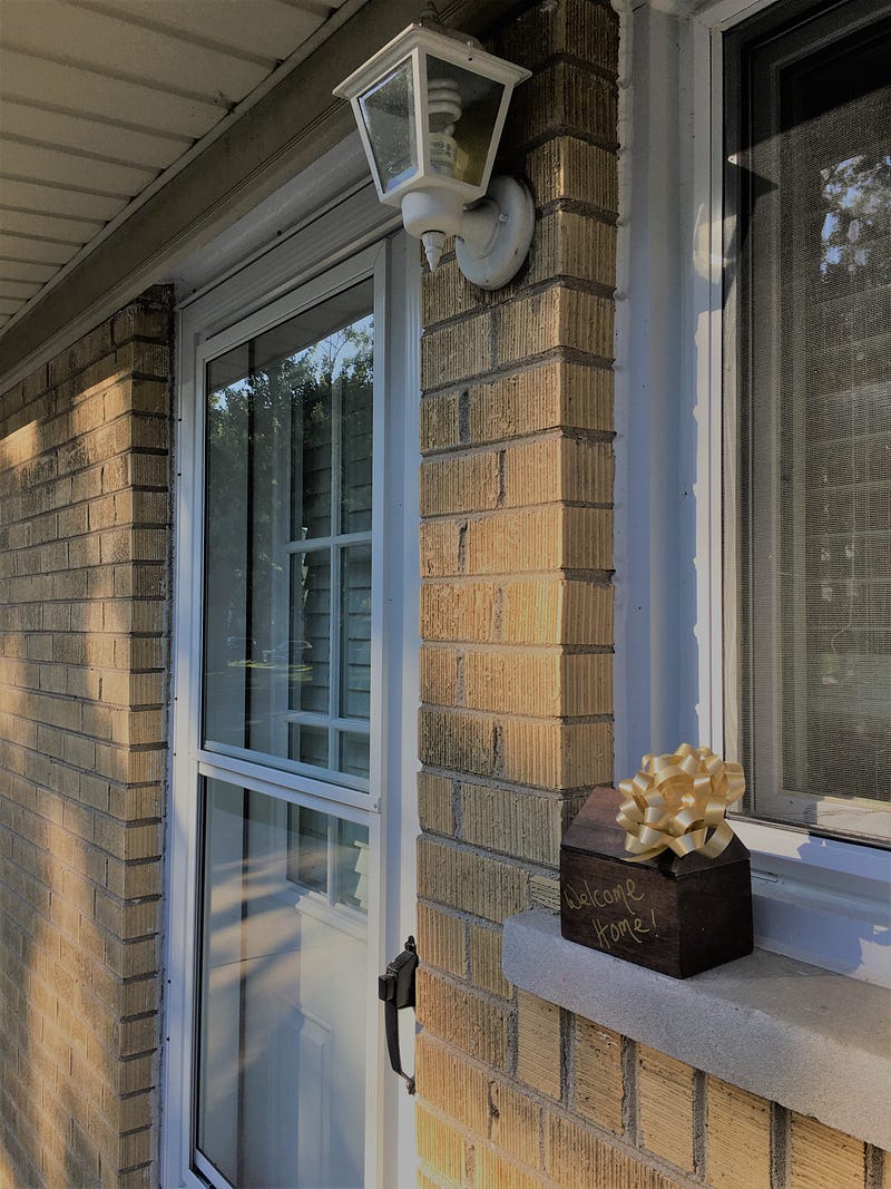 Welcome home gift at front door for home buyers