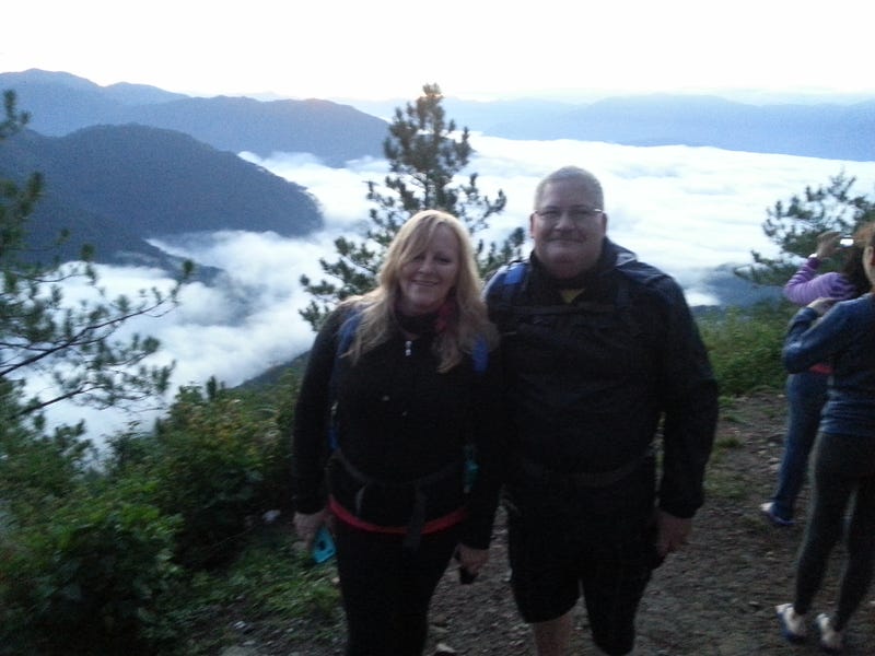 Standing beside my best pal, Linda, with the cloud inversion in the background.