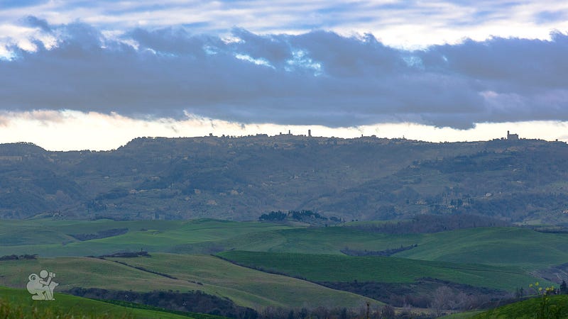 rolling hills of Tuscany looking south at the town of Volterra rolling hills of Tuscany looking south at the town of Volterra