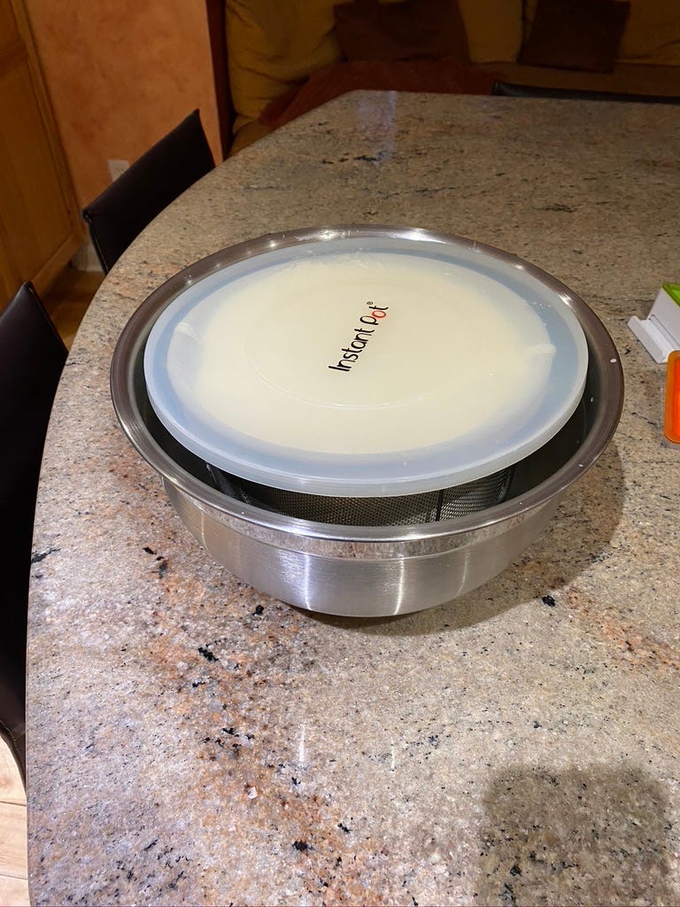 The bowl just catches the whey that drains off — you can do this however you like — even put it in the sink (but you can use the strained off whey for baking bread, making smoothies, etc).