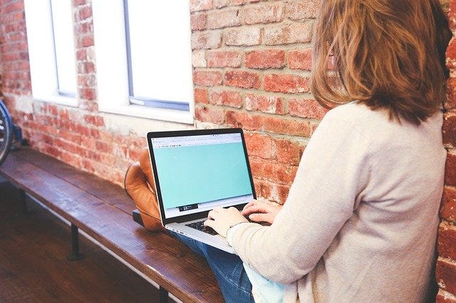 Girl on her laptop.