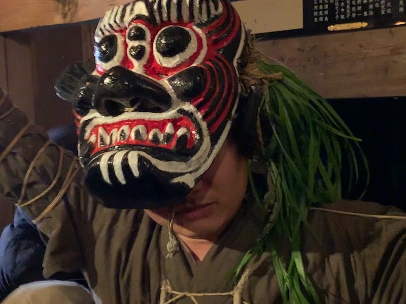 A man wear an oni mask as he participates in the Shujo Onie on Oita Prefecture’s Kunisaki Peninsula