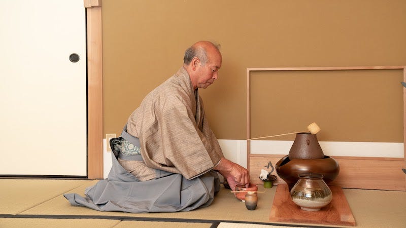 A teamaster prepares green tea as part of the tea ceremony in Akizuki, Fukuoka Prefecture