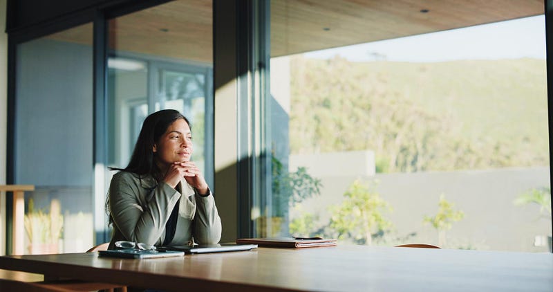 Investor quietly analyzing a portfolio on a laptop in a peaceful setting, reflecting careful and rational financial planning.