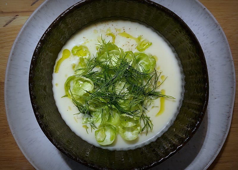 A bowl of lemony white cabbage soup
