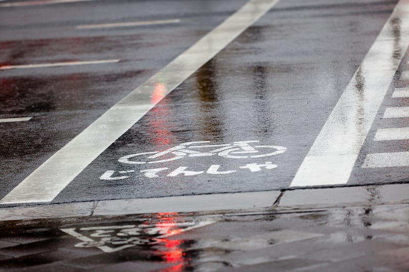 Constant rains from Japan’s rainy season soak the pavement in Tokyo