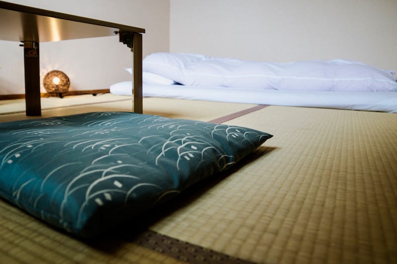 A futon on the tatami mat floor of a ryokan in Japan