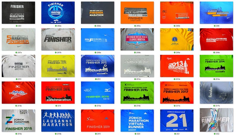 30 colorful marathon finisher shirts in a 6x5 grid