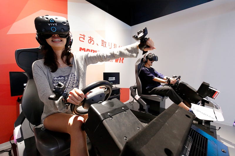 A couple tries the Mario Kart game at VR Zone Shinjuku in Tokyo