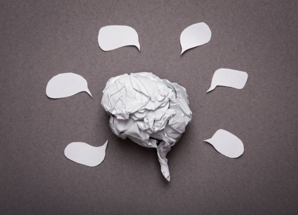 A crumpled paper brain symbol representing overthinking during exam stress