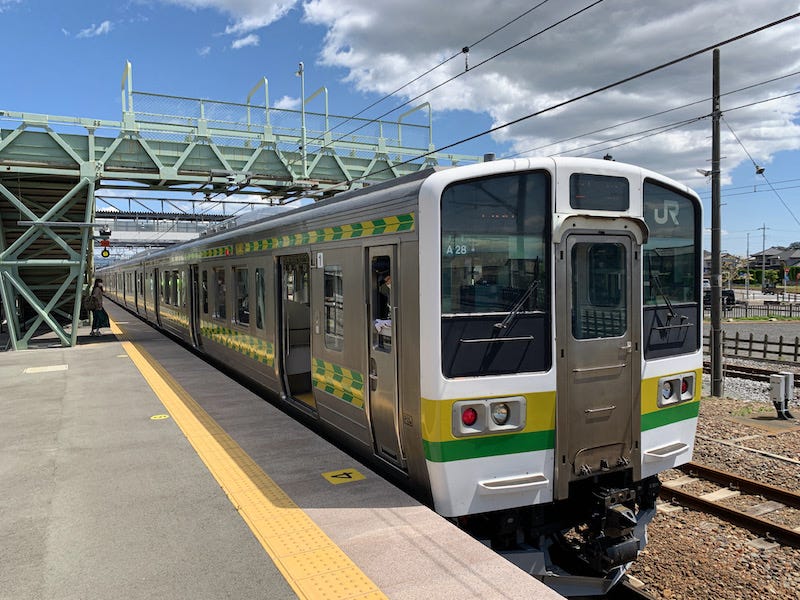 A train pulls into Kunisada Station in Gunma Prefecture