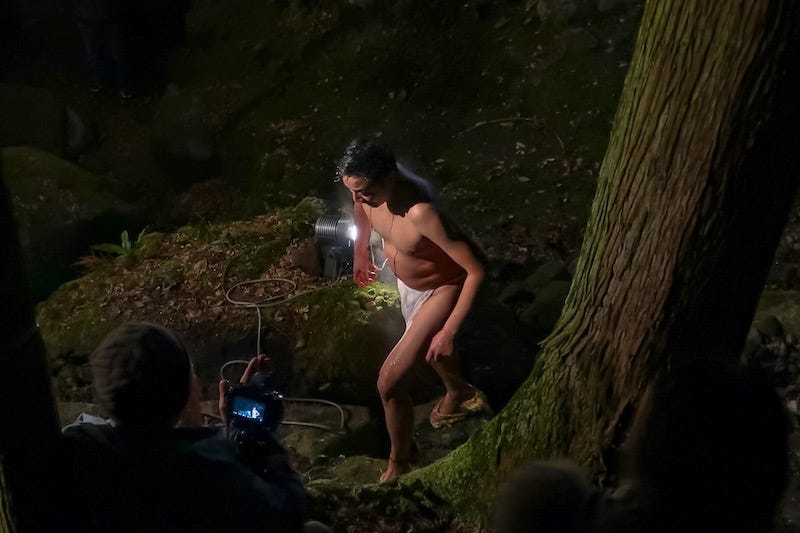 A man wearing only a fundoshi cleanses himself in frigid water for the Shujo Onie on Oita Prefecture’s Kunisaki Peninsula