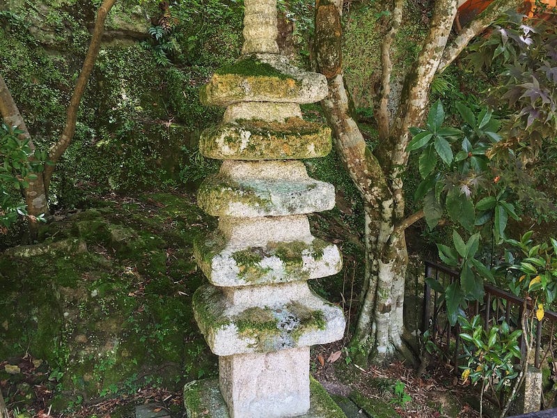 A stone pagoda found on Shiga Prefecture’s island of Chikubushima that came from Mt. Hiei