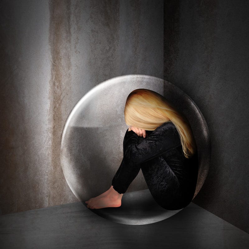 Woman curled inside a circle of fear