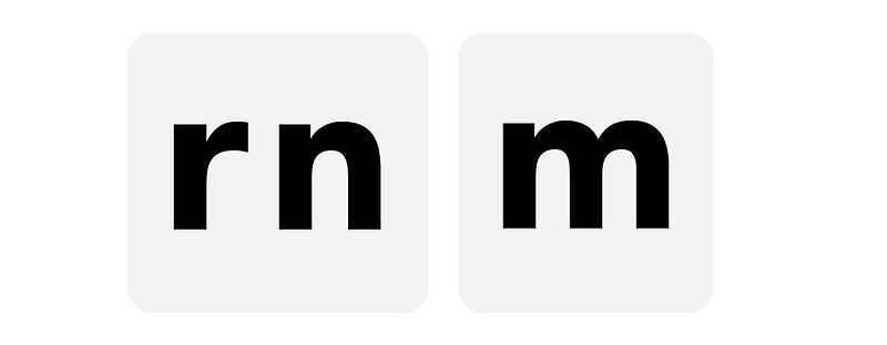 Side by side of characters: lower case r and n, lower case m