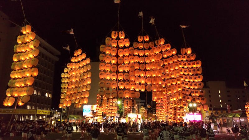 Lanterns are hoisted high into the sky for Akita City’s annual Kanto Festival