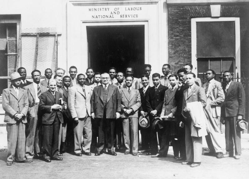 Group of West Indians outside of the Ministry of Labour building