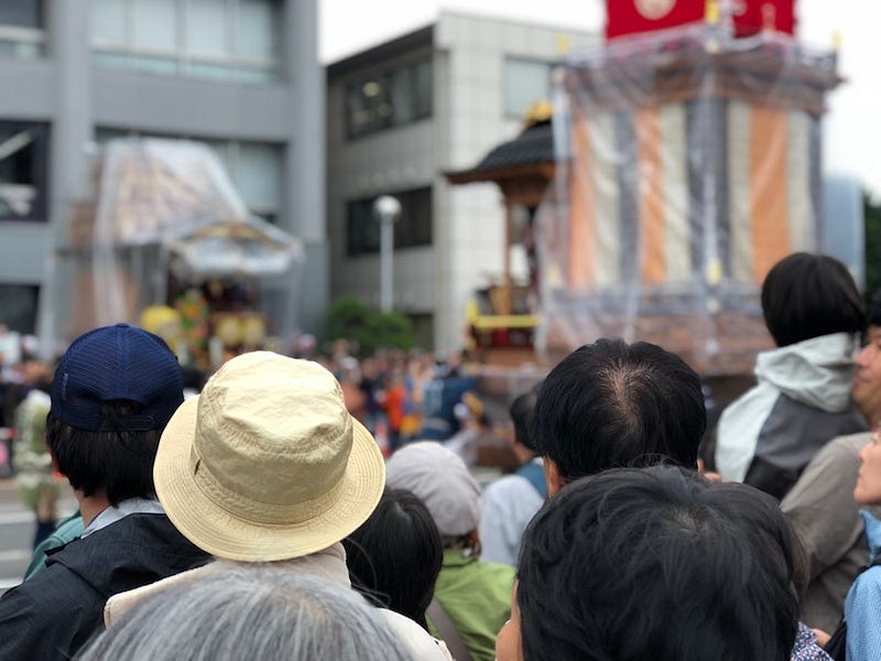 A large crowd watches Saitama Prefecture’s Kawagoe Festival take place