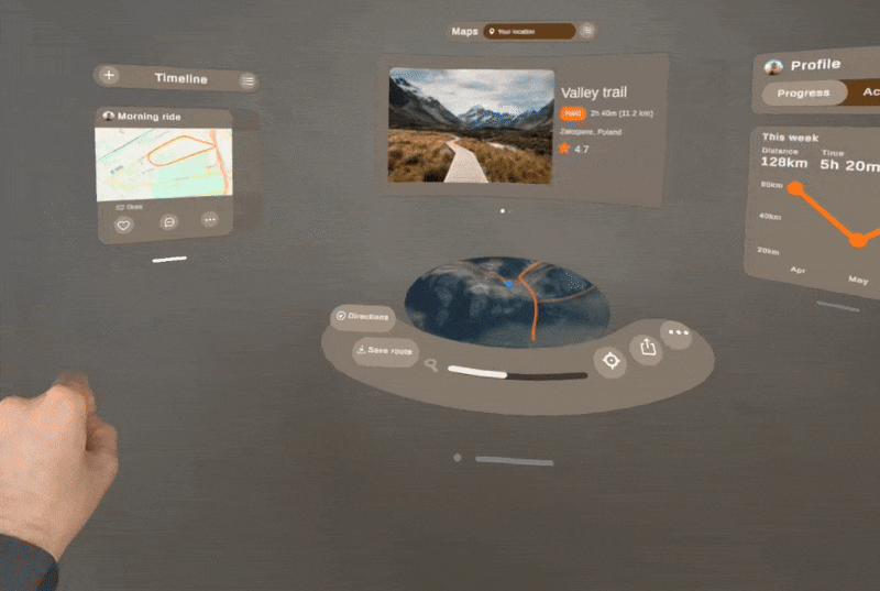 Using AR app in 3D space, dragging windows by hand, pointing to select items in the distance.