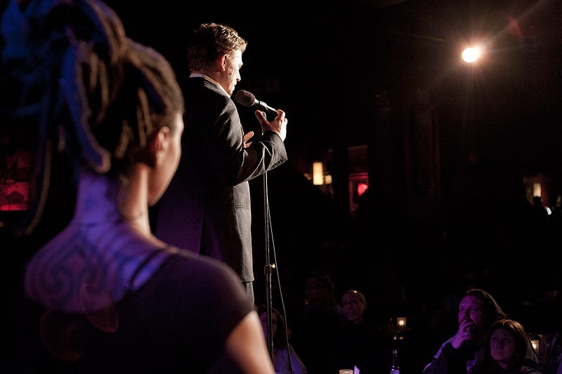 A speaker telling a monologue at the theatre The Moth in New York