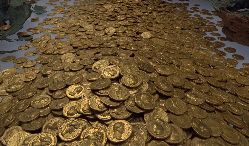 Image of gold coins from a hoard — source Wikipedia — http://creativecommons.org/licenses/by-sa/3.0/ with no alterations or changes to the photo. Photo: Th Zühmer