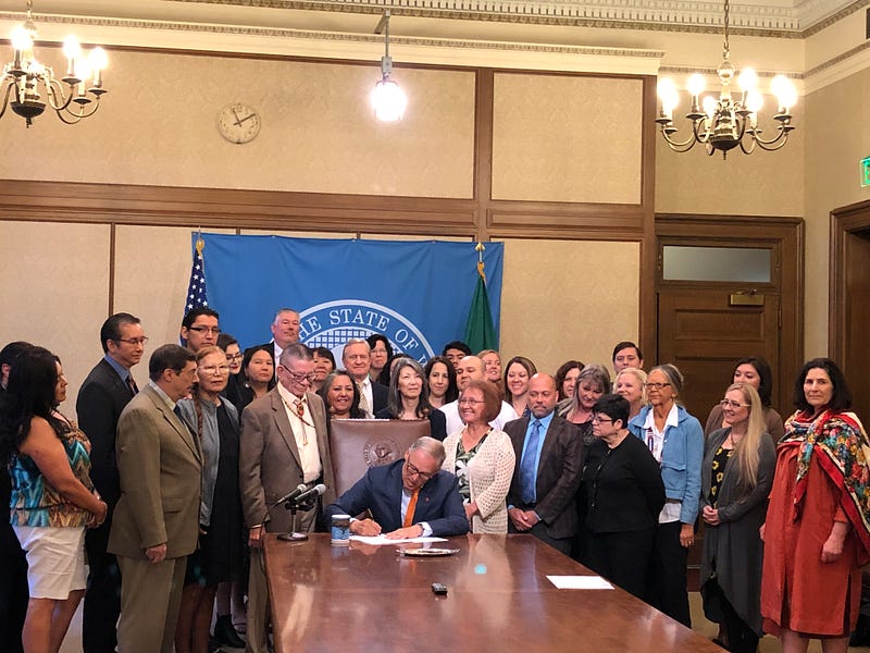 Governor Inslee signing Washington State Tribal Health Bill