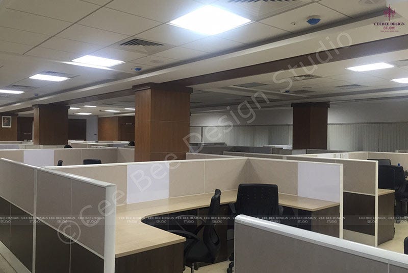 Office cubicles in a spacious open area, providing privacy and a productive work environment.