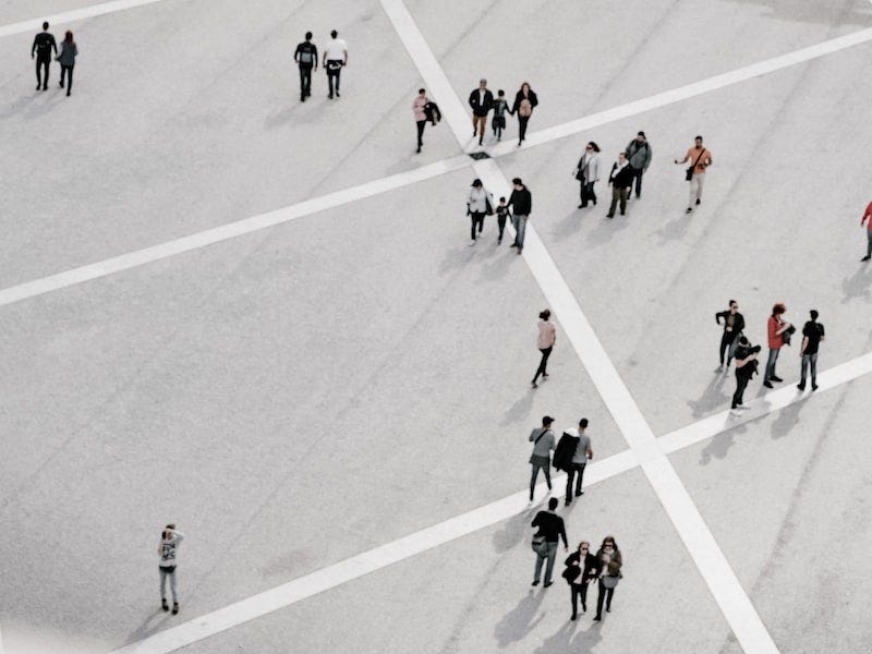People standing on a grid.