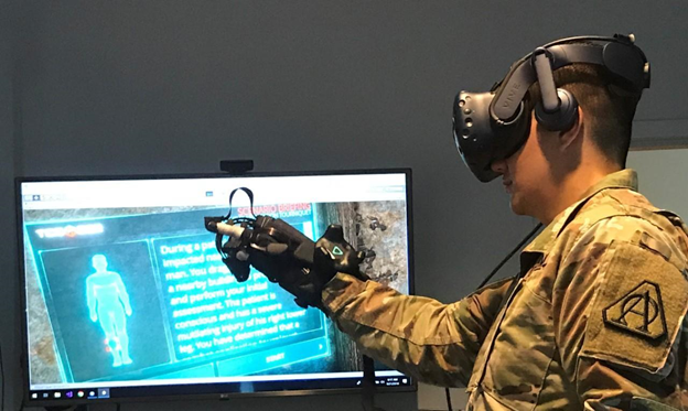 Soldier uses HaptX Gloves to interact with the U.S. Army’s Tactical Combat Casualty Care Simulation