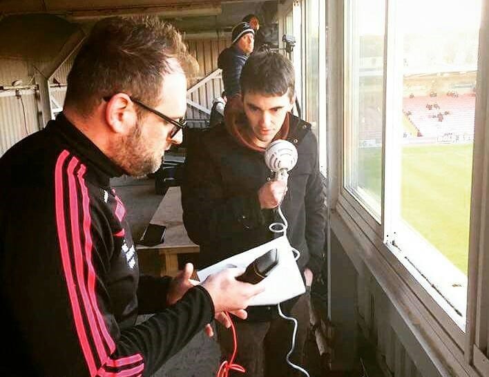 Ronan in the earlier days, commentating with another media officer at the time, Gary Doyle.