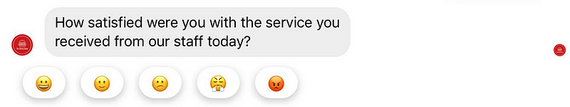 emoji answers can help you improve survey response rates like in this example from a ServiceDock survey over Facebook Messenger