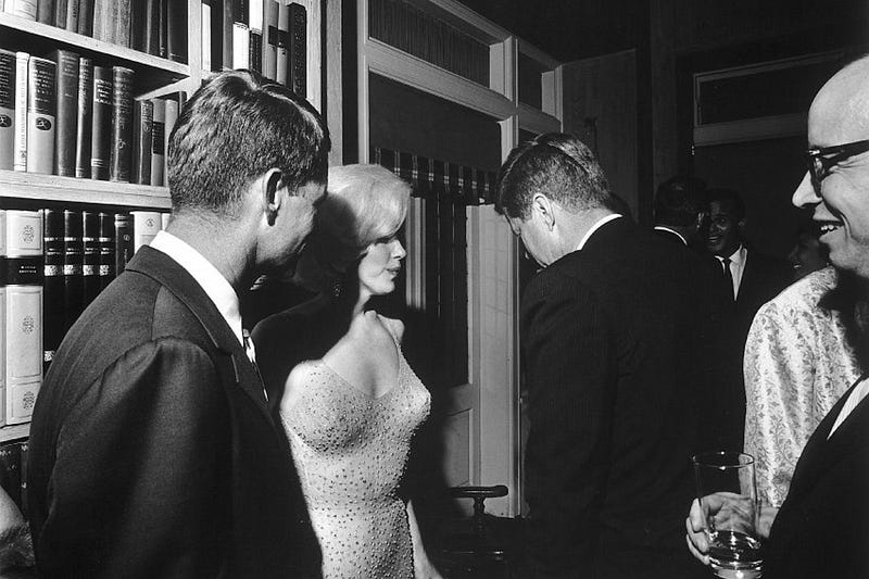 Robert Kennedy and his brother pictured with Marilyn Monroe in 1962