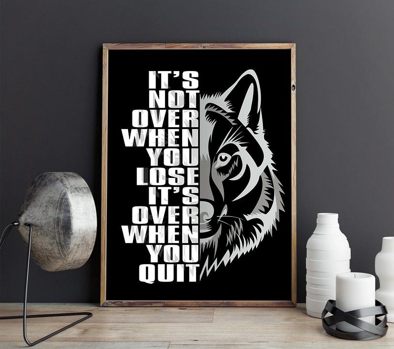 Wolf Warrior Quote “It’s Not Over When You Lose, It’s Over When You Quit” Image.