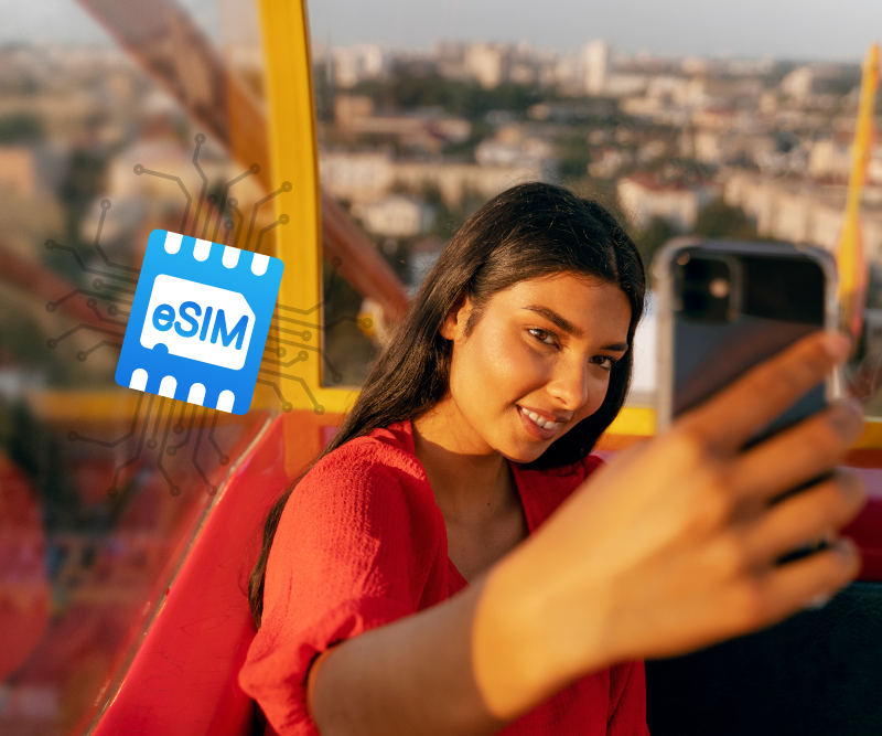 A girl taking a selfie while travelling with an eSIM Australia.