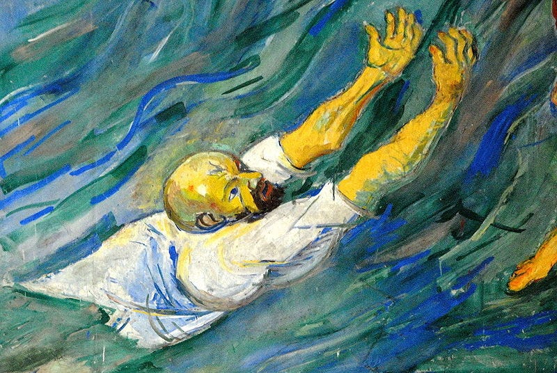 A bald man with a goatee wearing a white shirt is surrounded by waves that cover him from the torso down. He reaches his arms upward towards something out of our view.