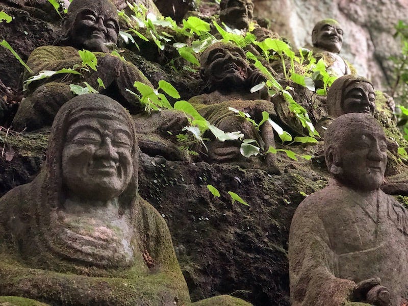 A bunch of stone Buddhas at Monjusen-ji on Oita Prefecture’s Kunisaki Peninsula