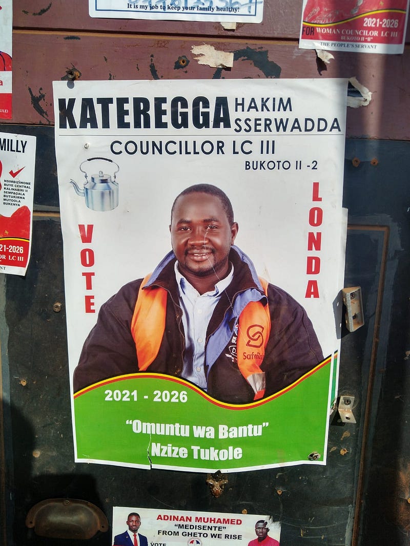 A boda rider running for local office, using his SafeBoda uniform to demonstrate his dependability. Credit: Tom Courtright.