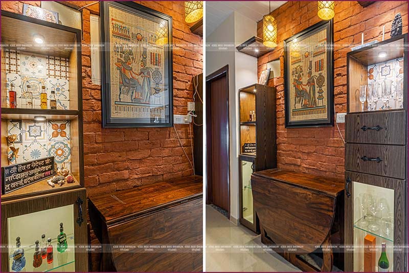 two pictures of a room with a wooden table and a cabinet against a brick wall design