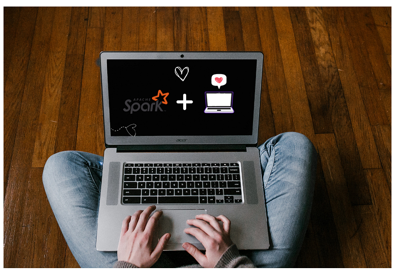 Um notebook no colo de um Engenheiro de dados utilizando Apache Spark